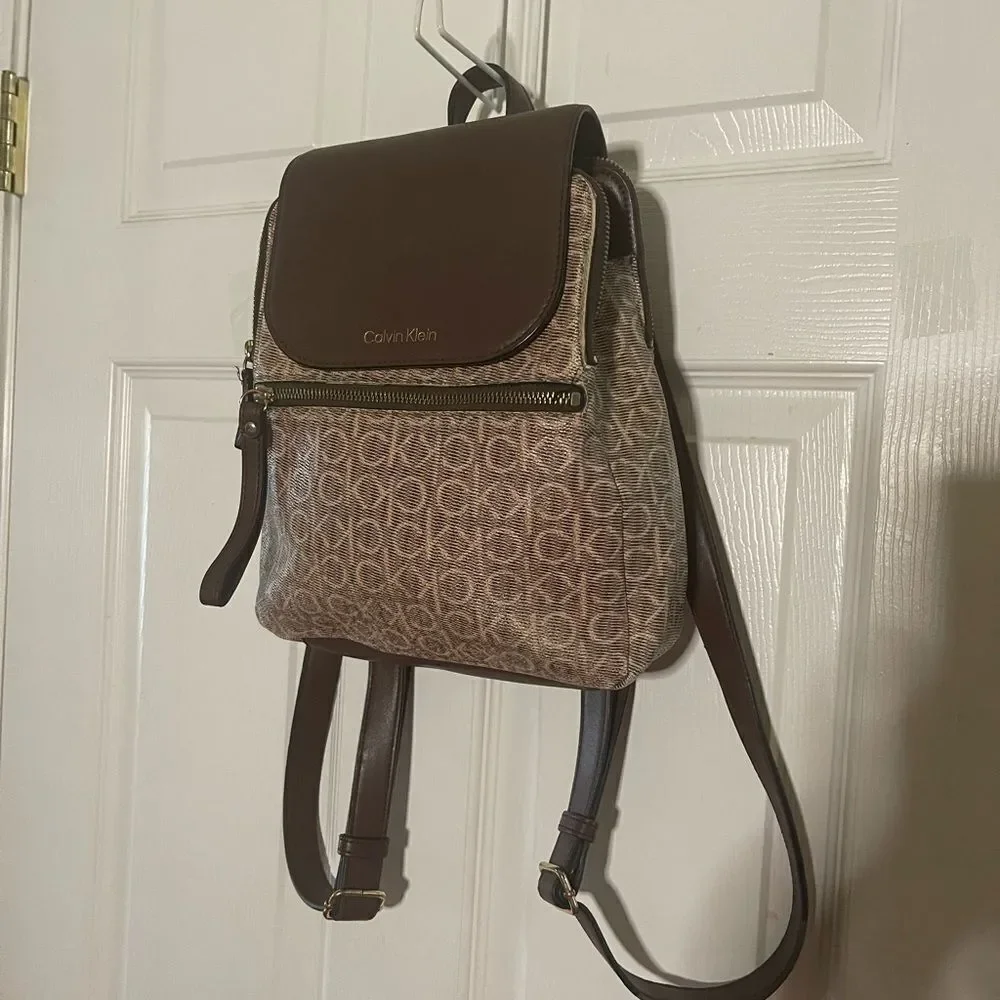 Calvin Klein Tan and Brown Logos  small Backpack logo tone hardwares.